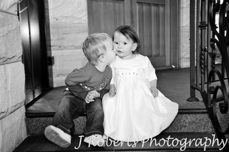 Little toddlers kissing at wedding - wedding photography sydney